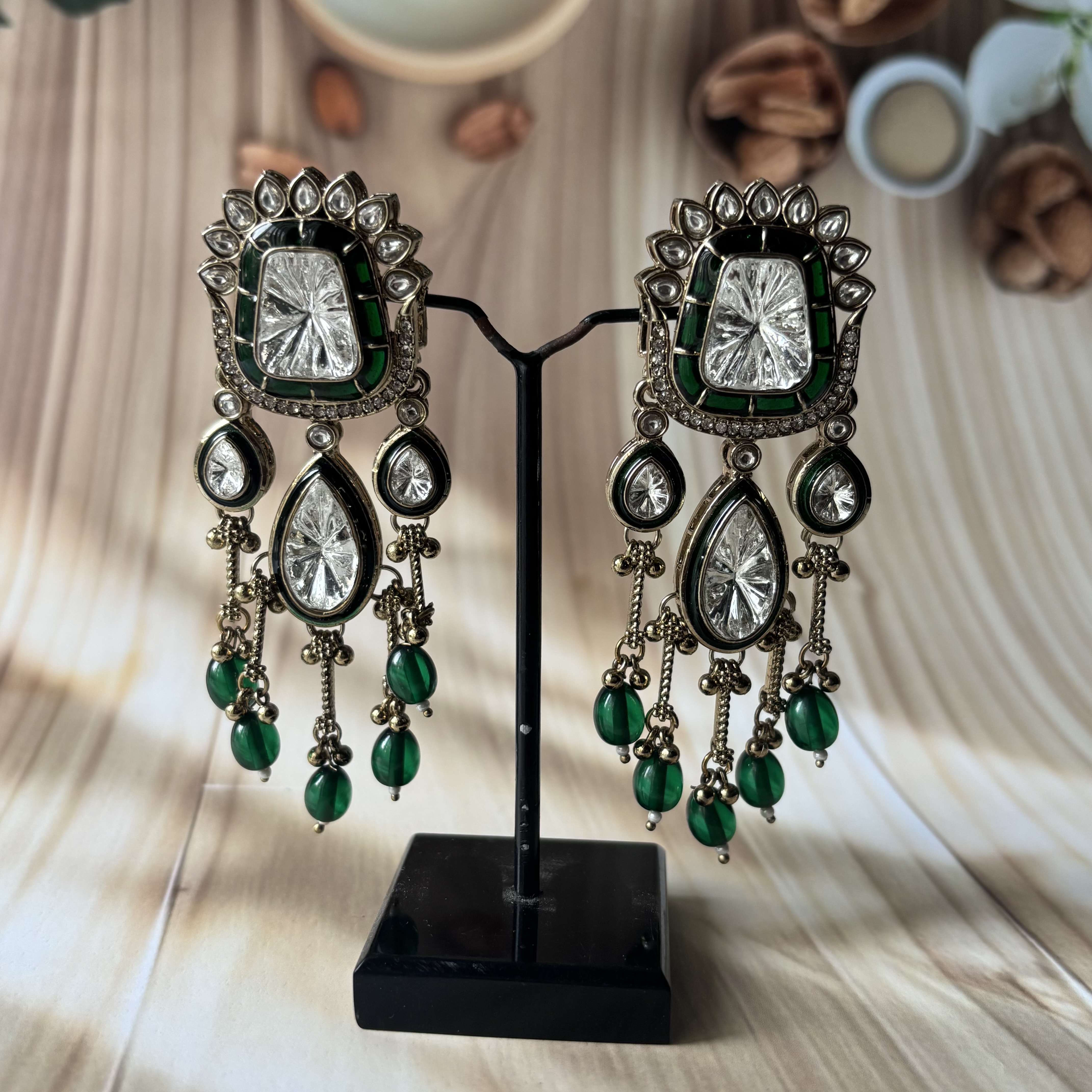 Green kundan earrings